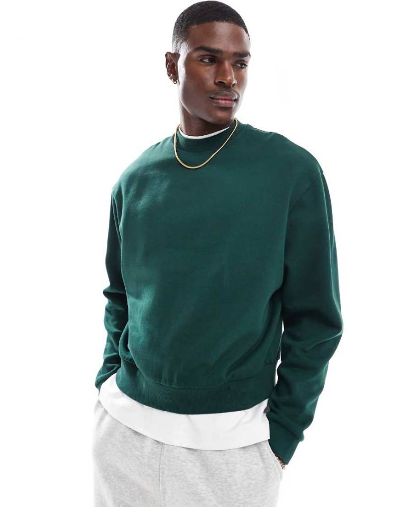 ASOS DESIGN - Essential - Kastiges Oversize-Sweatshirt in Dunkelgrün von ASOS DESIGN