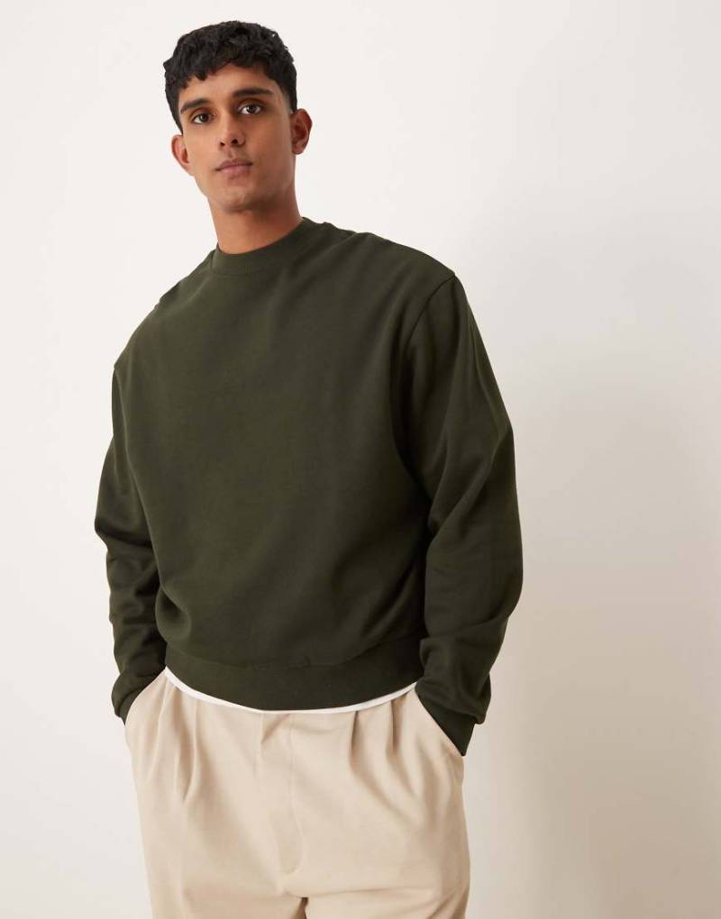 ASOS DESIGN - Essential - Kastiges Oversize-Sweatshirt in Dunkelgrün von ASOS DESIGN