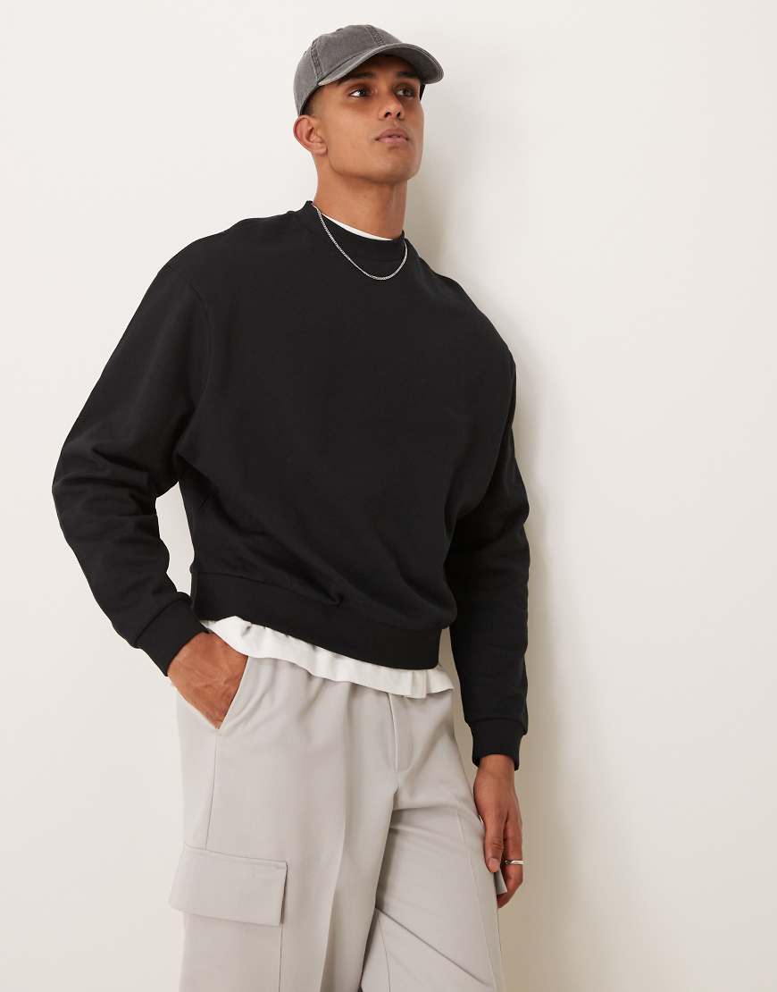 ASOS DESIGN - Essential - Kastiges Oversize-Sweatshirt in Schwarz ASOS DESIGN - Essential - Kastiges Oversize-Sweatshirt in Schwarz von ASOS DESIGN