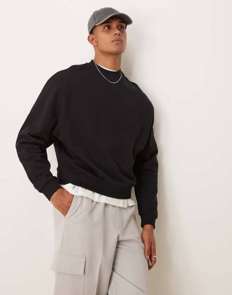 ASOS DESIGN - Essential - Kastiges Oversize-Sweatshirt in Schwarz von ASOS DESIGN