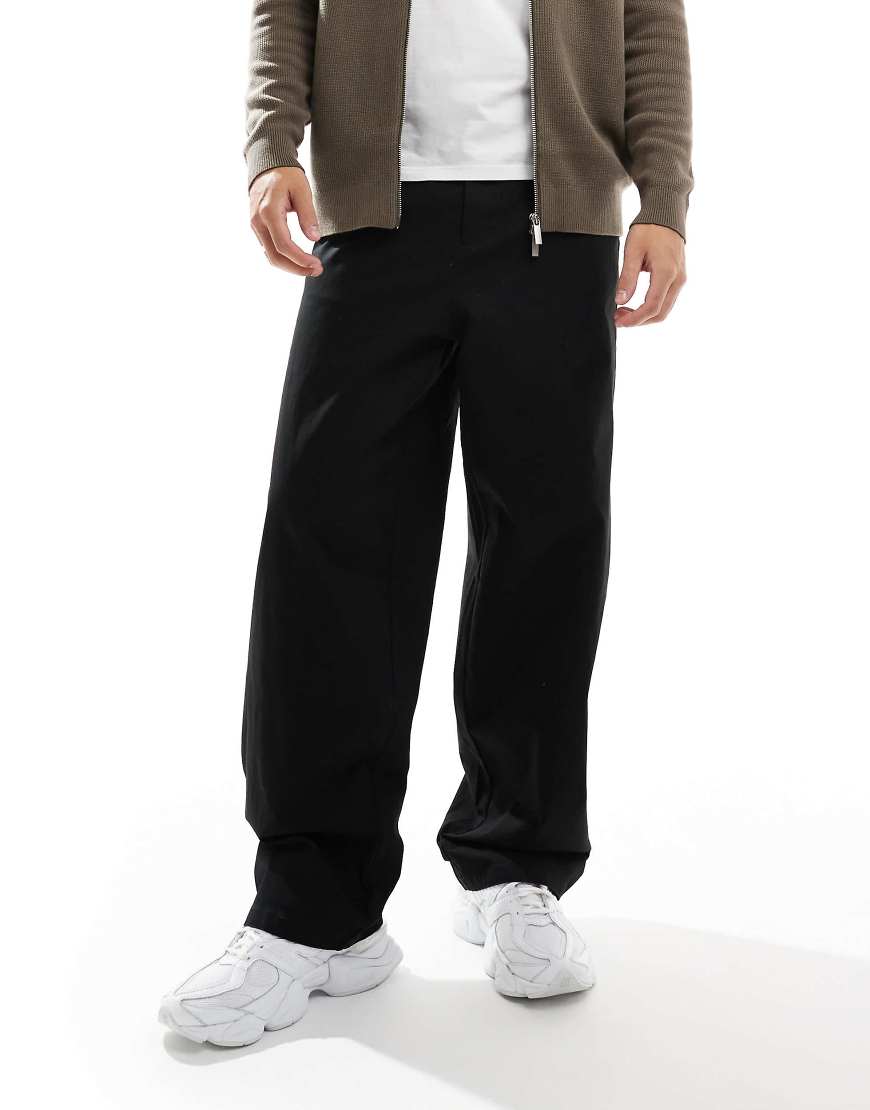ASOS DESIGN - Locker geschnittene Chinohose in Schwarz ASOS DESIGN - Locker geschnittene Chinohose in Schwarz von ASOS DESIGN