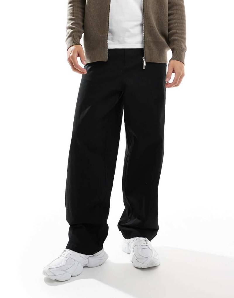 ASOS DESIGN - Locker geschnittene Chinohose in Schwarz von ASOS DESIGN