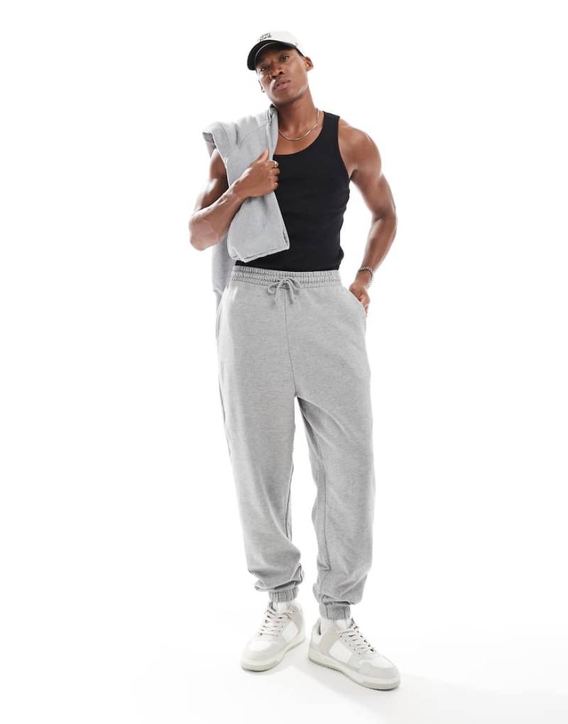 ASOS DESIGN - Essential - Oversize-Jogginghose in Grau meliert von ASOS DESIGN