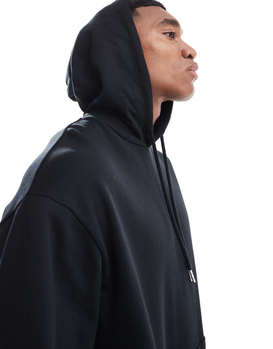 ASOS DESIGN - Essential - Oversize-Kapuzenpullover in Schwarz ASOS DESIGN - Essential - Oversize-Kapuzenpullover in Schwarz von ASOS DESIGN