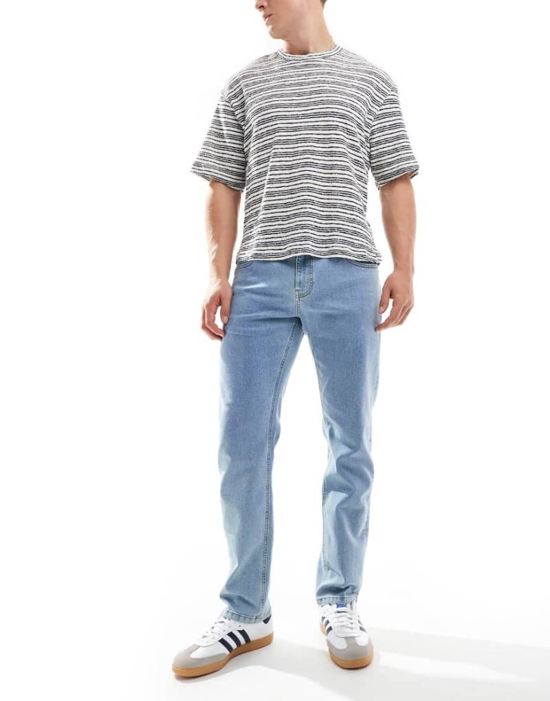 ASOS DESIGN - Schmale Stretch-Jeans in heller Waschung-Blau von ASOS DESIGN