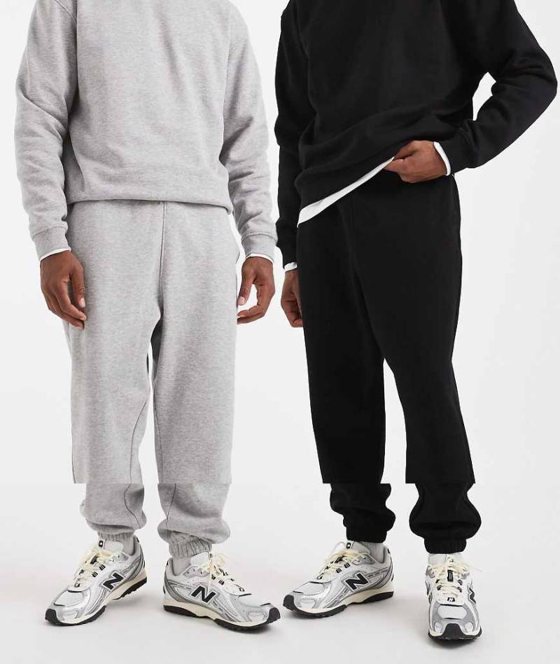 ASOS DESIGN - Essentials - 2er-Pack Oversize-Jogginghosen in Schwarz und meliertem Grau-Bunt ASOS DESIGN - Essentials - 2er-Pack Oversize-Jogginghosen in Schwarz und meliertem Grau-Bunt von ASOS DESIGN