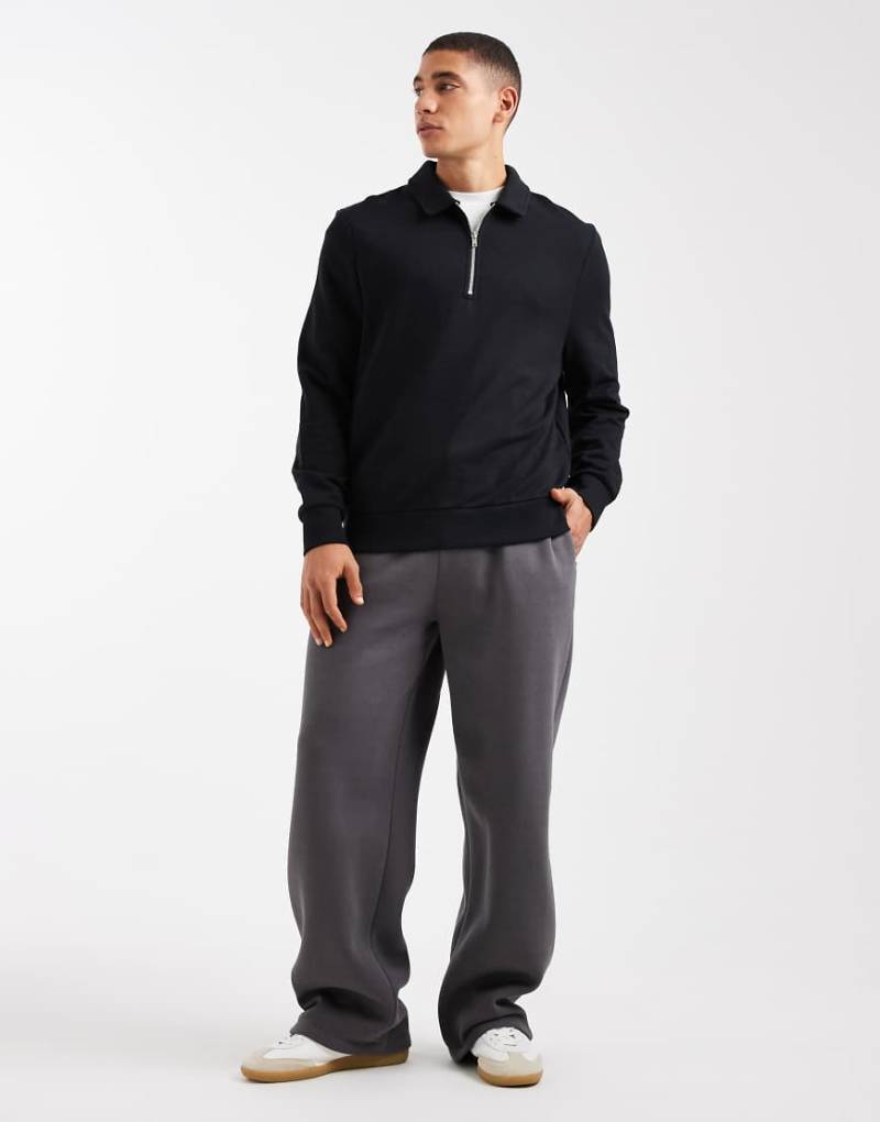 ASOS DESIGN - Essentials - Jogginghose in verwaschenem Schwarz mit weitem Bein-Grau von ASOS DESIGN