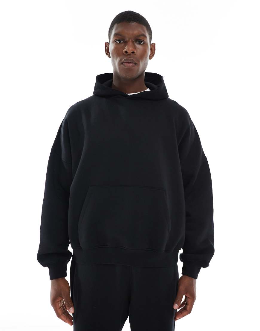 ASOS DESIGN - Essentials - Kapuzenpullover in Schwarz mit extremer Oversize-Passform von ASOS DESIGN