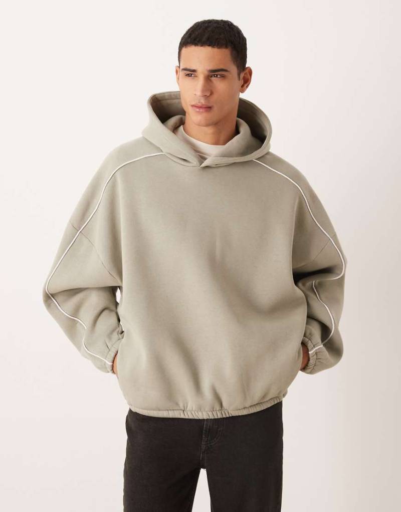ASOS DESIGN - Extremer Oversize-Kapuzenpullover in Khaki mit kontrastierendem Paspeldetail-Grün von ASOS DESIGN
