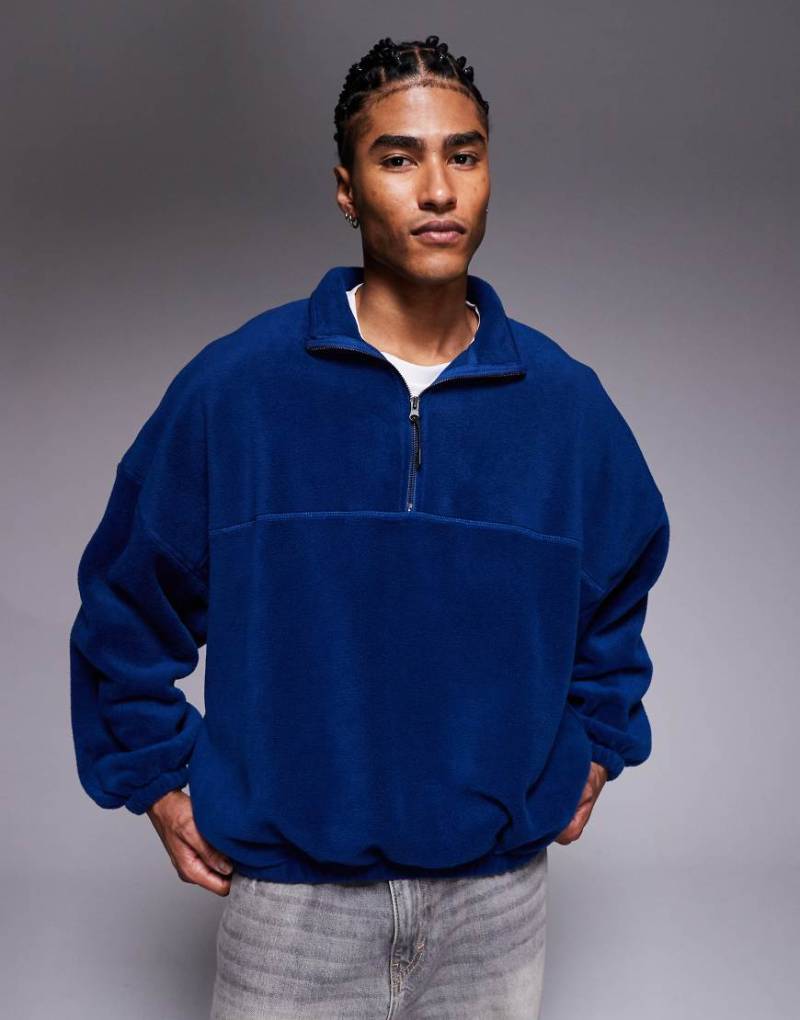 ASOS DESIGN - Extremes Oversize-Sweatshirt aus Fleece in Blau mit Stehkragen und kurzem Reißverschluss von ASOS DESIGN