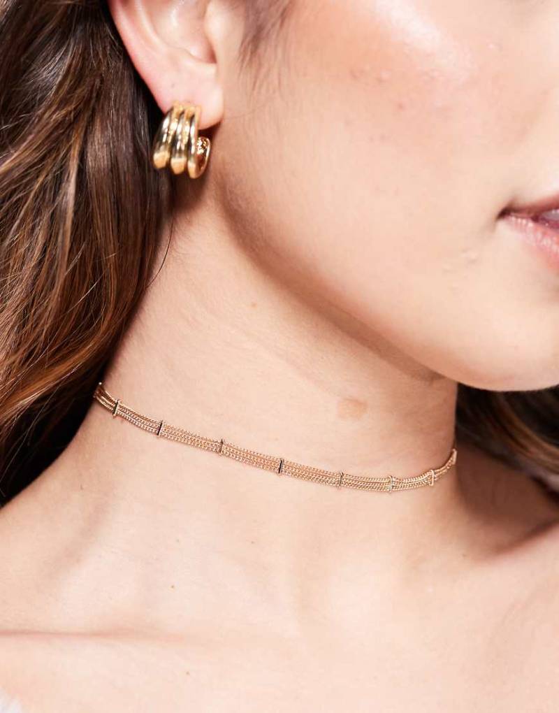 ASOS DESIGN - Feine Choker-Halskette in Goldoptik mit Stabdetail-Goldfarben von ASOS DESIGN