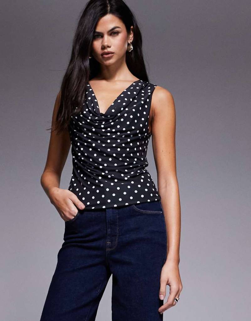 ASOS DESIGN - Figurbetontes, drapiertes Oberteil in Schwarz mit Wasserfallausschnitt und Polka Dots-Bunt von ASOS DESIGN