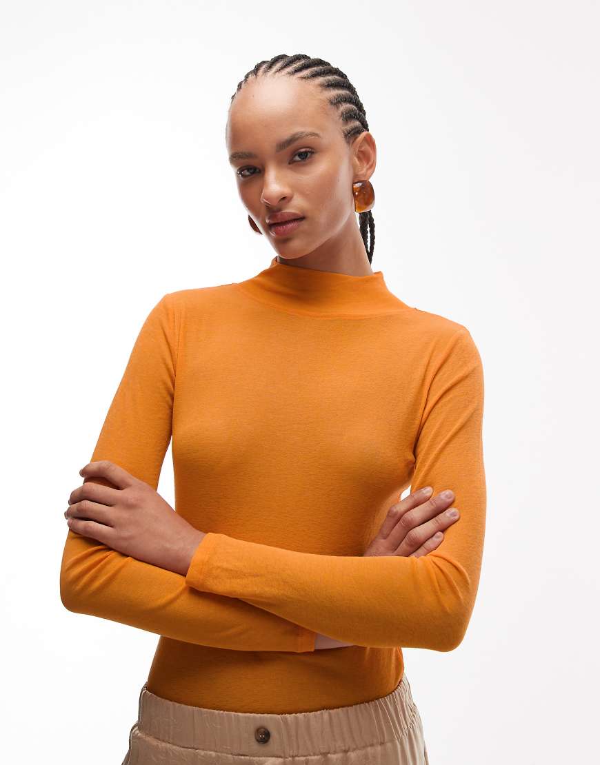 ASOS DESIGN - Figurbetontes Polohemd in Orange mit langen Ärmeln von ASOS DESIGN