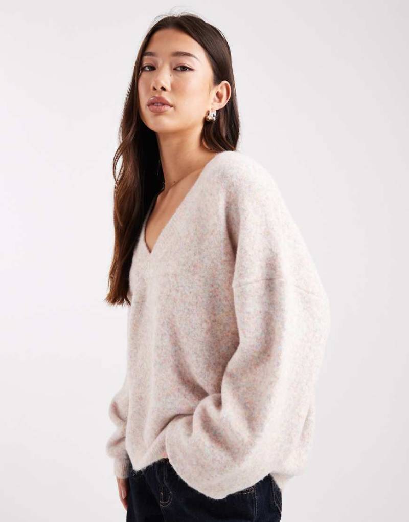 ASOS DESIGN - Flauschiger Pullover in meliertem Rosa mit tiefem V-Ausschnitt-Lila ASOS DESIGN - Flauschiger Pullover in meliertem Rosa mit tiefem V-Ausschnitt-Lila von ASOS DESIGN