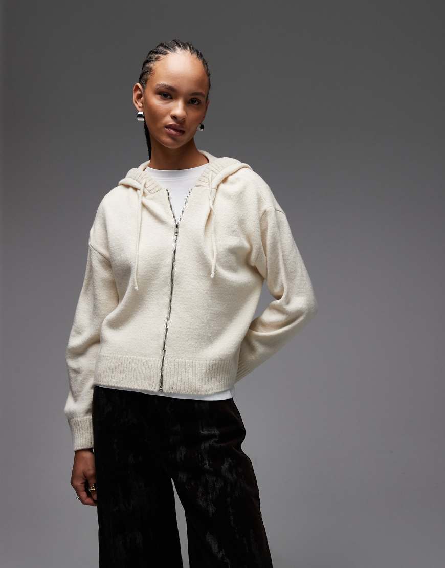 ASOS DESIGN - Flauschiger Strickpullover in Ecru mit Kapuze, Zopfmuster und Reißverschluss-Weiß ASOS DESIGN - Flauschiger Strickpullover in Ecru mit Kapuze, Zopfmuster und Reißverschluss-Weiß von ASOS DESIGN