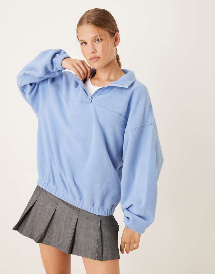 ASOS DESIGN - Fleece-Sweatshirt in Dämmerungsblau mit kurzem Reißverschluss ASOS DESIGN - Fleece-Sweatshirt in Dämmerungsblau mit kurzem Reißverschluss von ASOS DESIGN