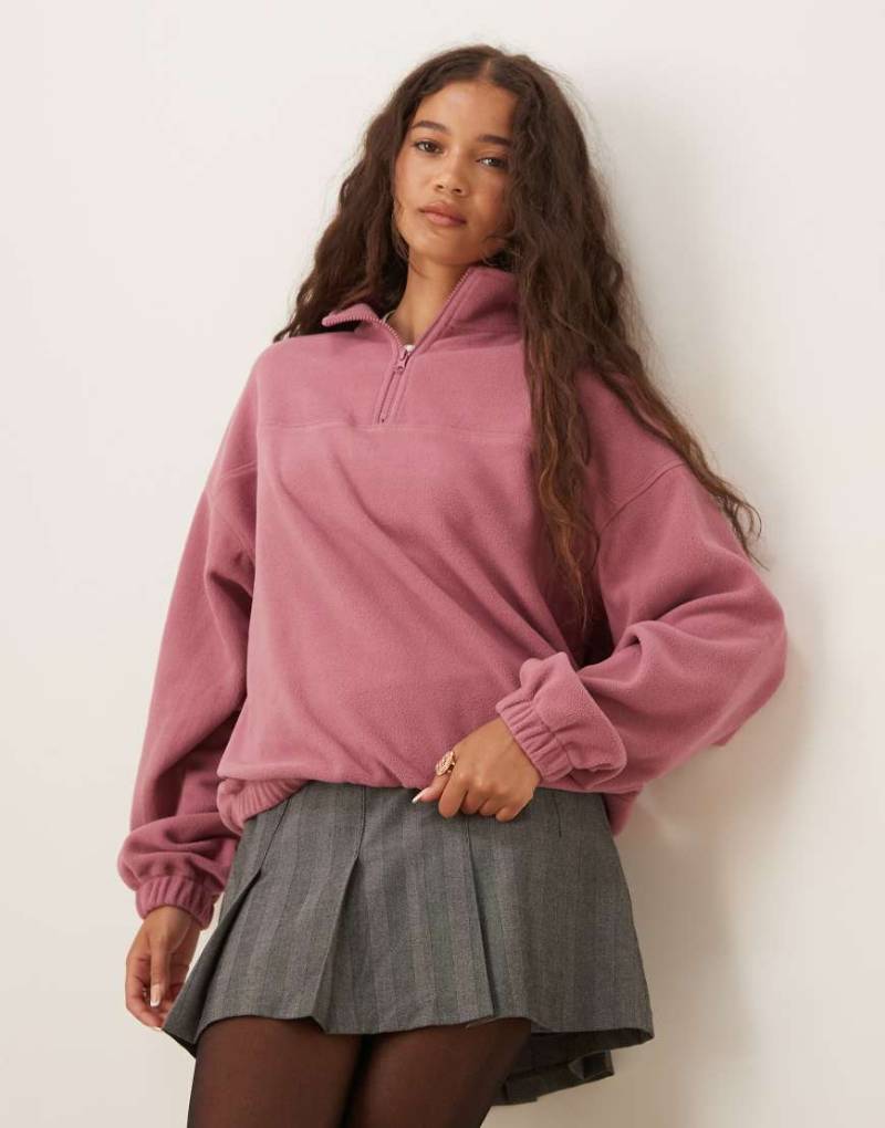 ASOS DESIGN - Fleece-Sweatshirt in Rosé mit kurzem Reißverschluss-Rosa von ASOS DESIGN