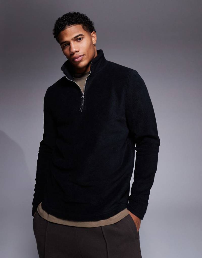ASOS DESIGN - Fleece-Sweatshirt in Schwarz mit kurzem Reißverschluss von ASOS DESIGN
