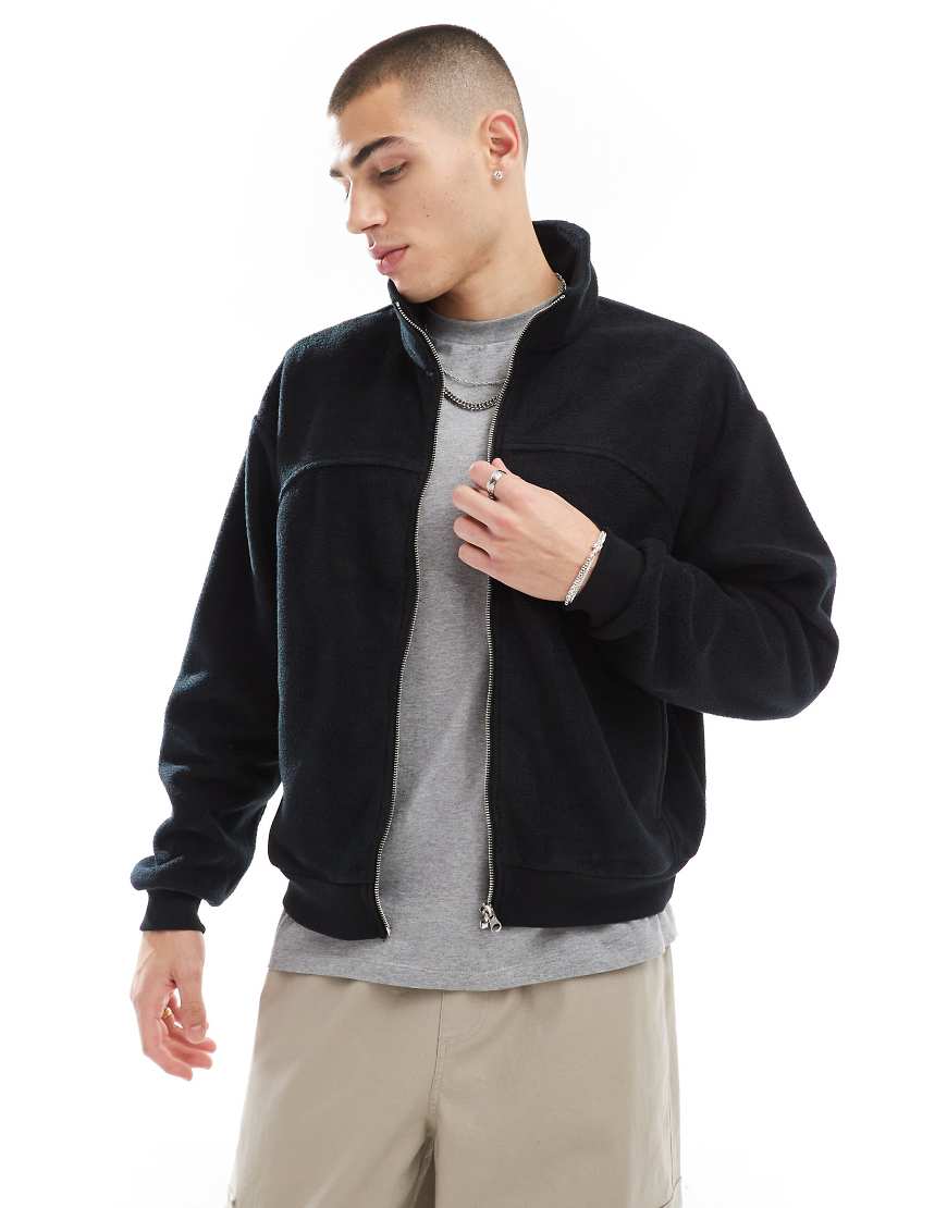 ASOS DESIGN - Fleece-Trainingsjacke in Schwarz mit kurzem Schnitt ASOS DESIGN - Fleece-Trainingsjacke in Schwarz mit kurzem Schnitt von ASOS DESIGN
