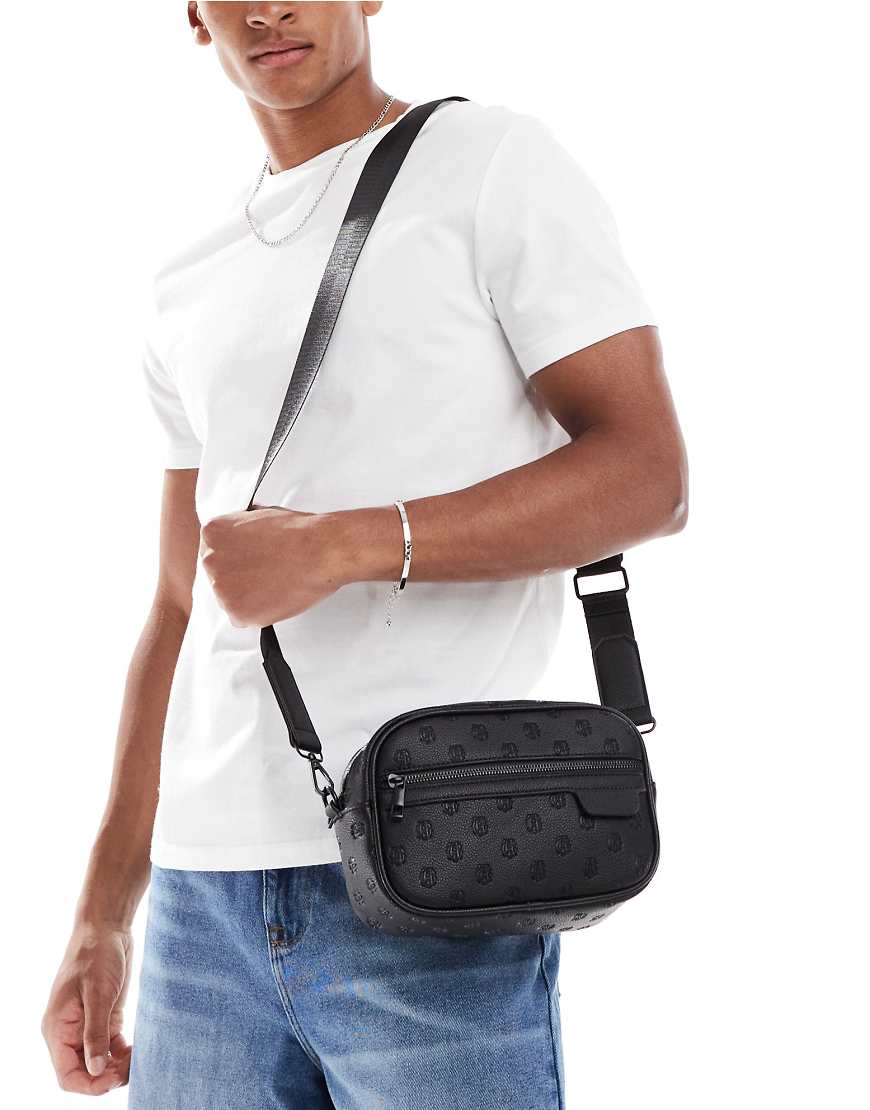 ASOS DESIGN - Geprägte Umhängetasche aus Kunstleder in Schwarz ASOS DESIGN - Geprägte Umhängetasche aus Kunstleder in Schwarz von ASOS DESIGN