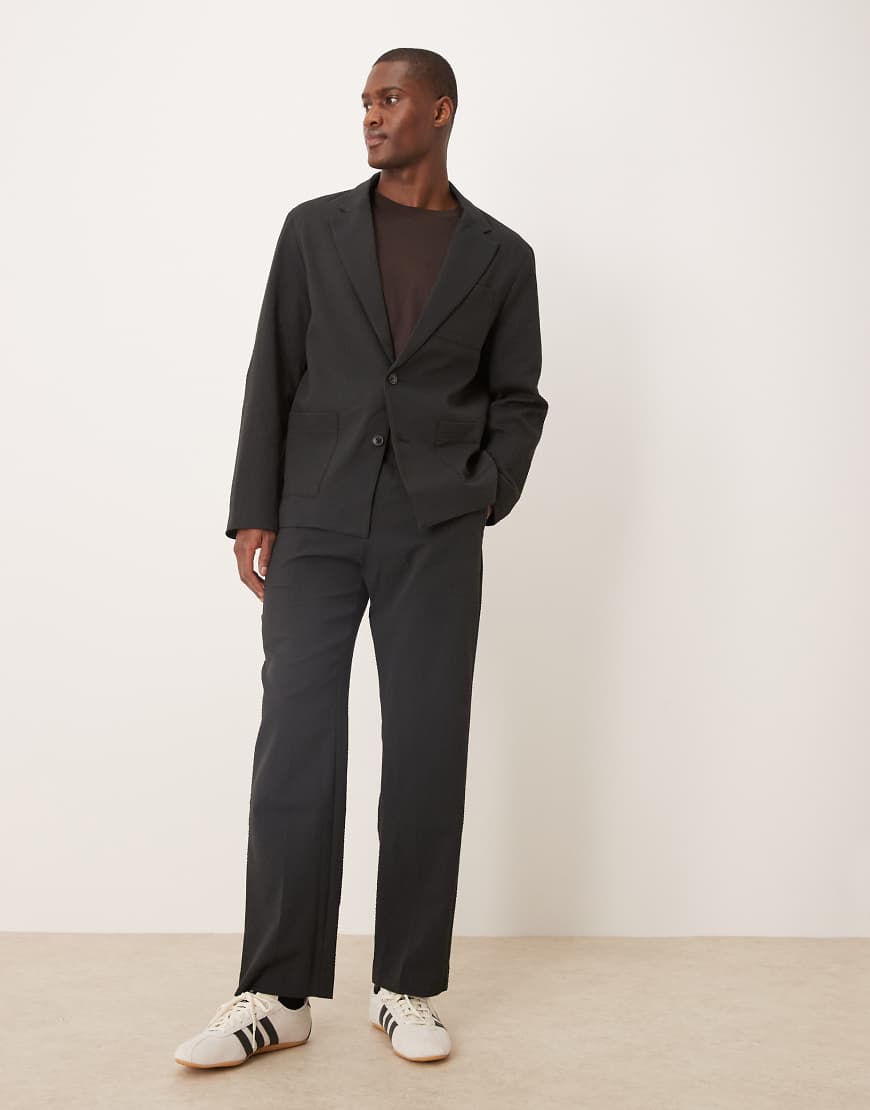 ASOS DESIGN - Gerade geschnittene Anzughose aus Seersucker in Schwarz-Grau ASOS DESIGN - Gerade geschnittene Anzughose aus Seersucker in Schwarz-Grau von ASOS DESIGN