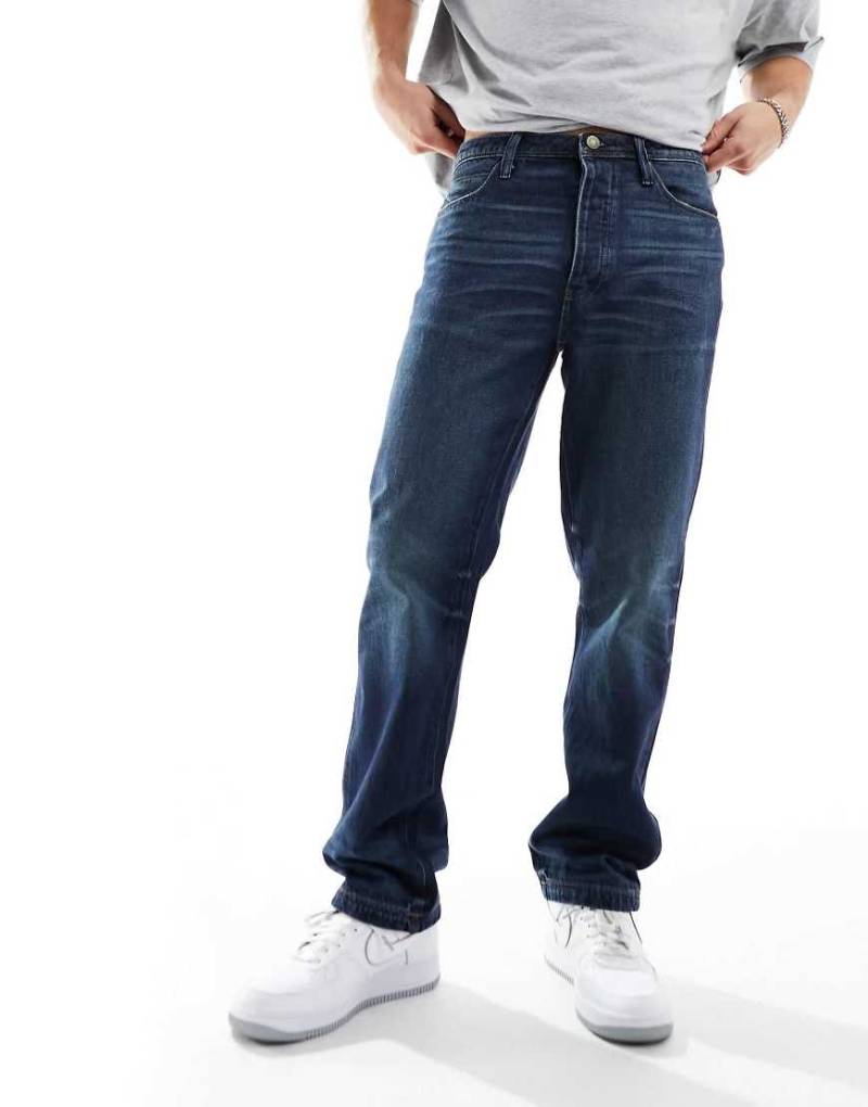 ASOS DESIGN - Gerade geschnittene Jeans in dunkler Vintage-Waschung-Blau von ASOS DESIGN