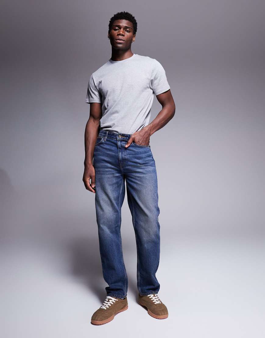 ASOS DESIGN - Gerade geschnittene Jeans in verwaschenem Dunkelblau mit Vintage-Farbstich von ASOS DESIGN