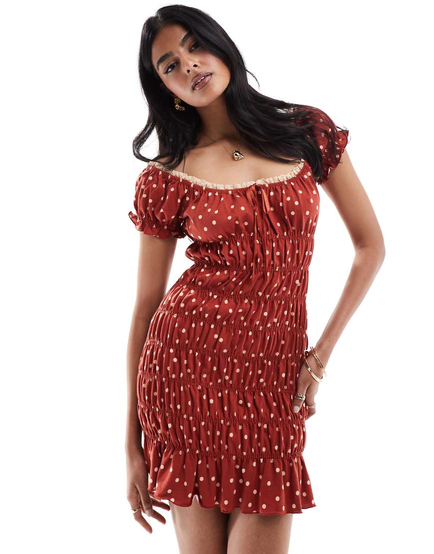 ASOS DESIGN - Gerafftes Mini-Freizeitkleid in Rot mit Punkten und Bindeband vorn ASOS DESIGN - Gerafftes Mini-Freizeitkleid in Rot mit Punkten und Bindeband vorn von ASOS DESIGN