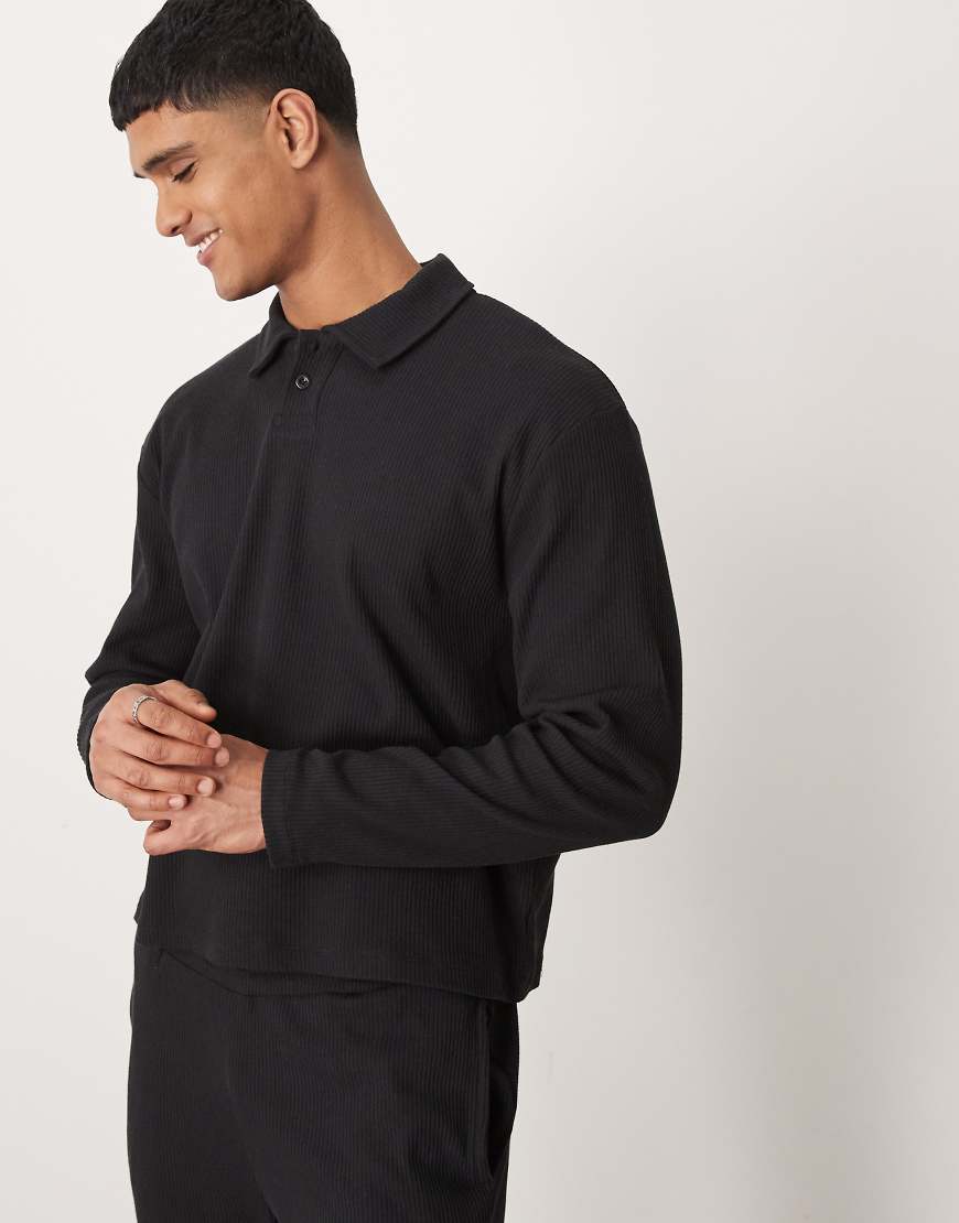 ASOS DESIGN - Geripptes Oversize-Sweatshirt in verwaschenem Schwarz mit Polokragen, Kombiteil-Grau von ASOS DESIGN