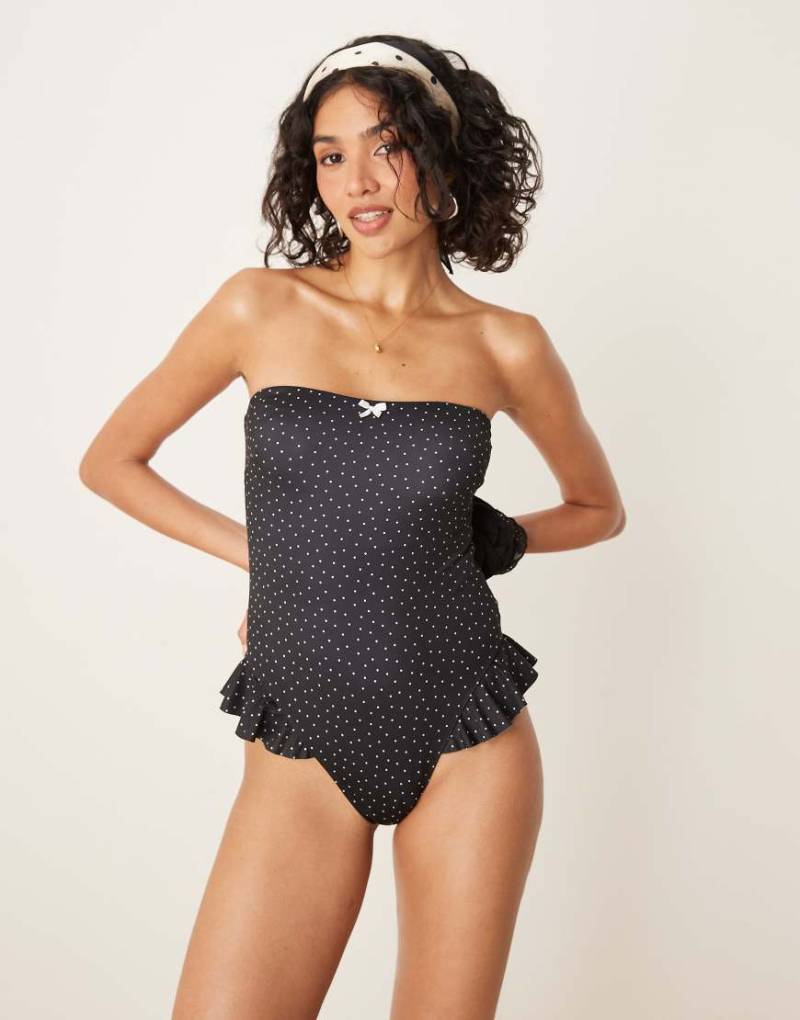 ASOS DESIGN - Gerri - Trägerloser Badeanzug in Schwarz mit Punkten von ASOS DESIGN