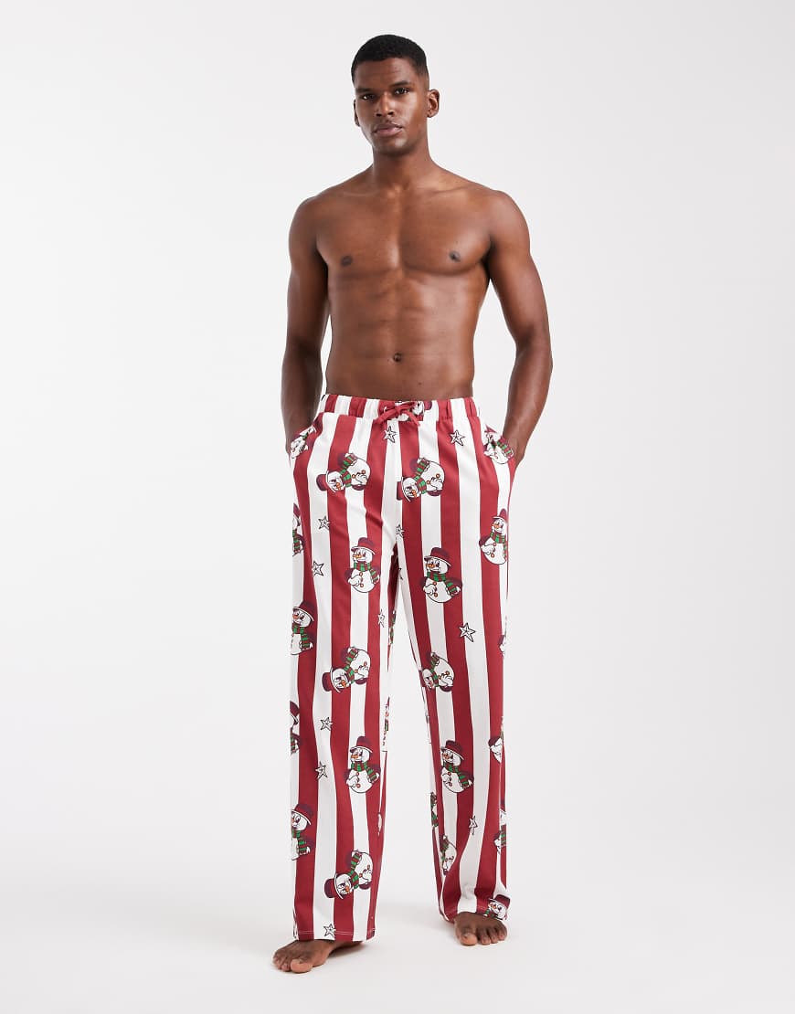 ASOS DESIGN - Gestreifte Lounge-Hose in Rot mit weihnachtlichem Schneemannmuster von ASOS DESIGN