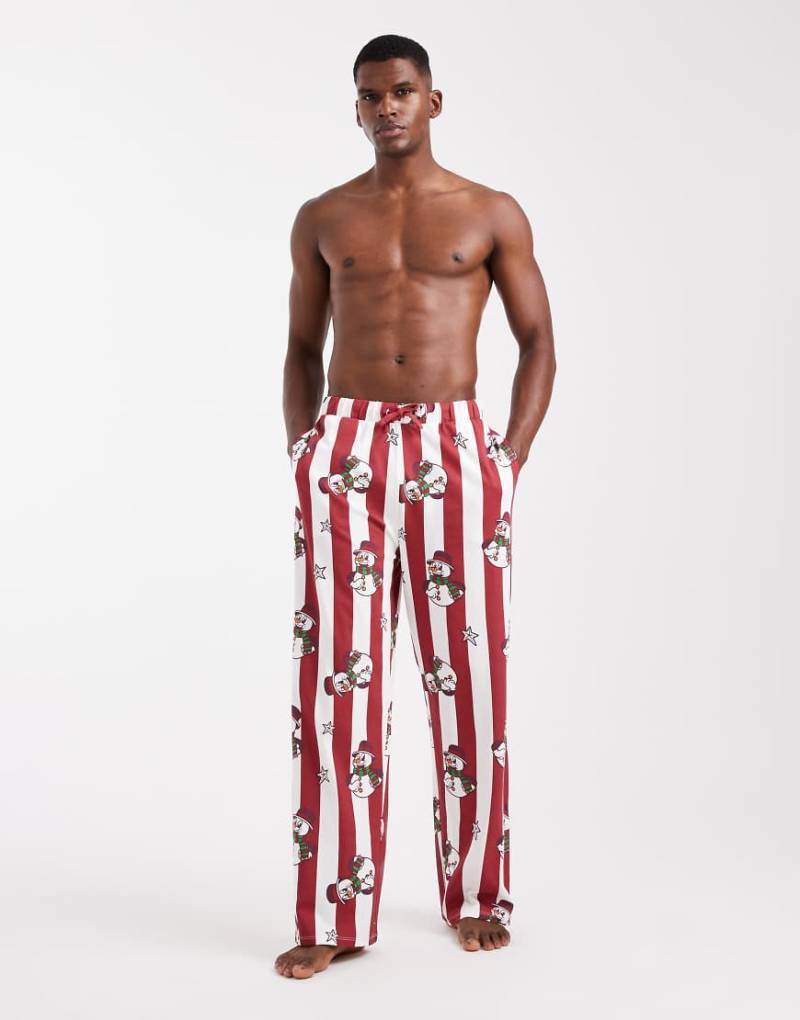 ASOS DESIGN - Gestreifte Lounge-Hose in Rot mit weihnachtlichem Schneemannmuster von ASOS DESIGN