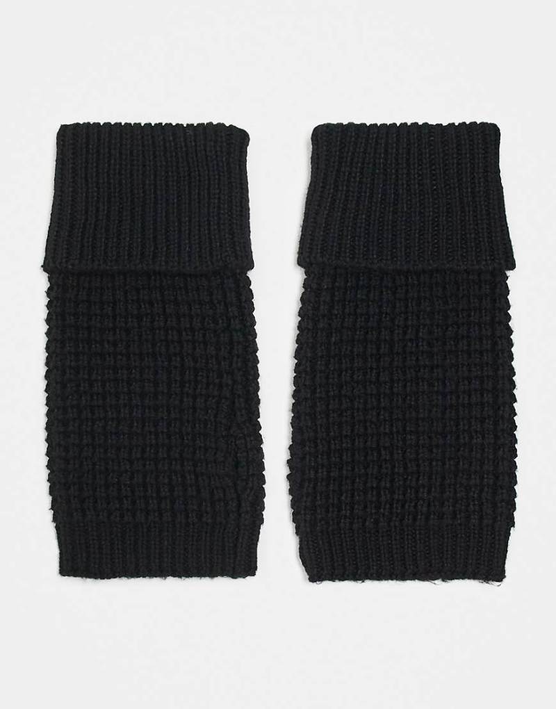 ASOS DESIGN - Gestrickte Handstulpen in Schwarz mit Waffelstruktur von ASOS DESIGN