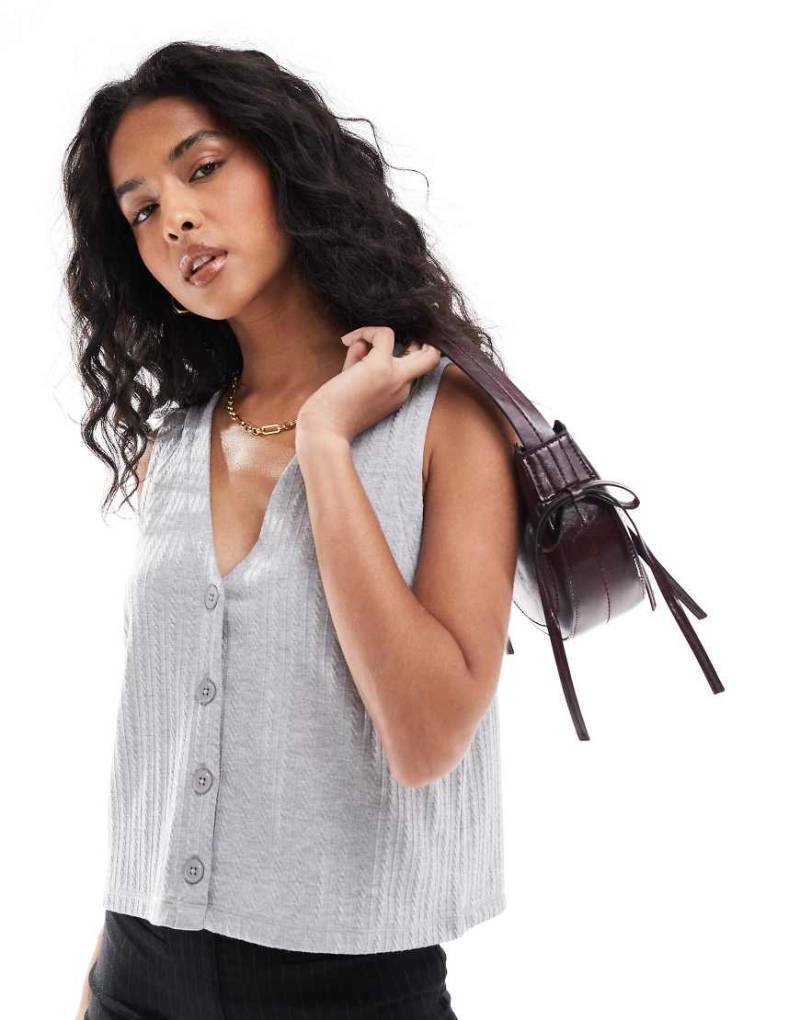 ASOS DESIGN - Gestrickte Jersey-Weste in meliertem Grau von ASOS DESIGN
