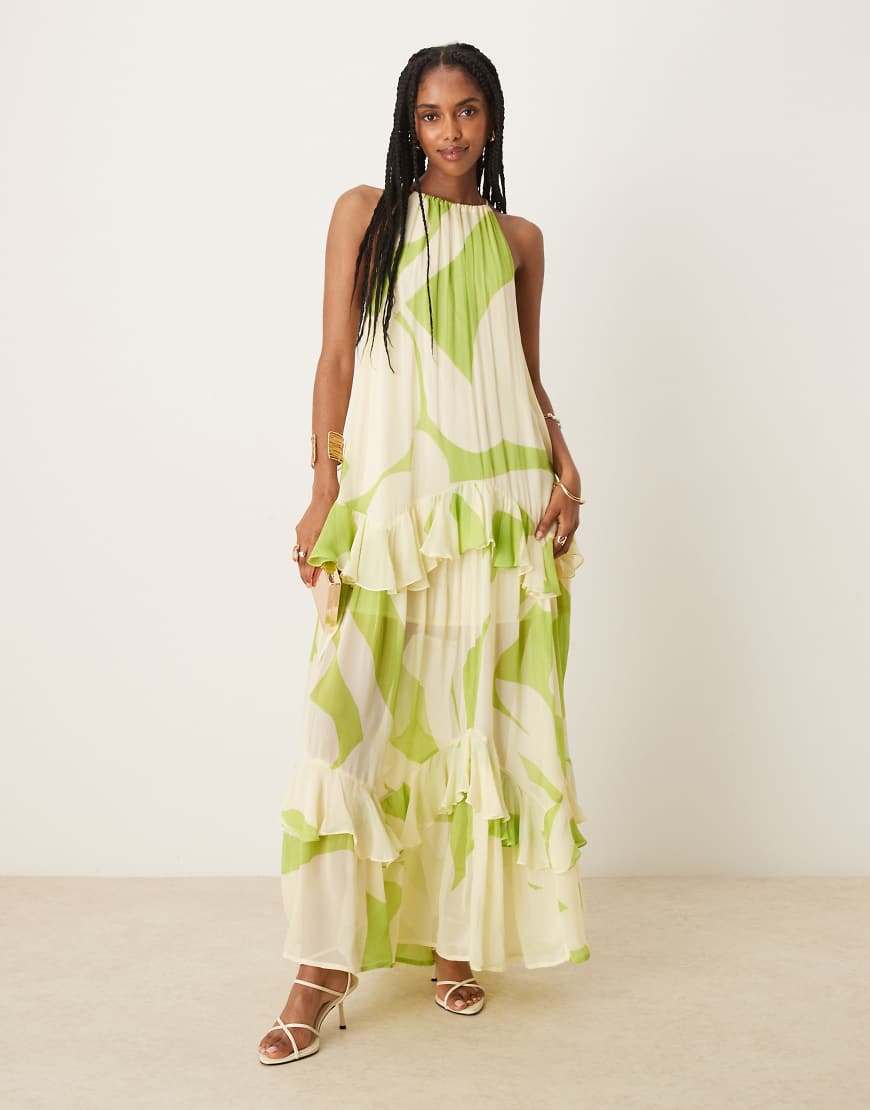 ASOS DESIGN - Gestuftes Neckholder-Maxikleid in Grün mit Rüschen und abstraktem Print ASOS DESIGN - Gestuftes Neckholder-Maxikleid in Grün mit Rüschen und abstraktem Print von ASOS DESIGN