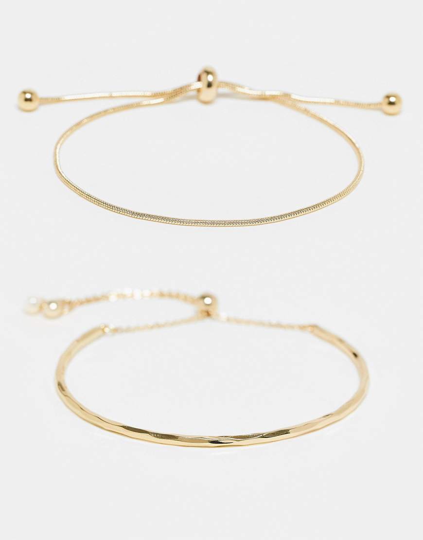 ASOS DESIGN - Goldfarbene Armbänder im 2er-Pack mit Knebel-Verschluss von ASOS DESIGN