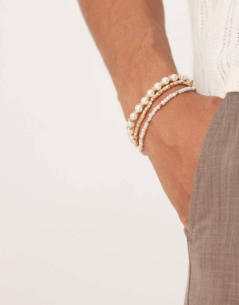 ASOS DESIGN - Goldfarbene Armbänder im Perlen- und Metalldesign im 3er-Pack von ASOS DESIGN