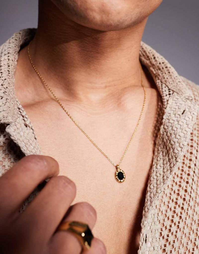 ASOS DESIGN - Goldfarbene Festival-Halskette aus wasserfestem Edelstahl mit ovalem Kunstperlen-Anhänger in Schwarz von ASOS DESIGN