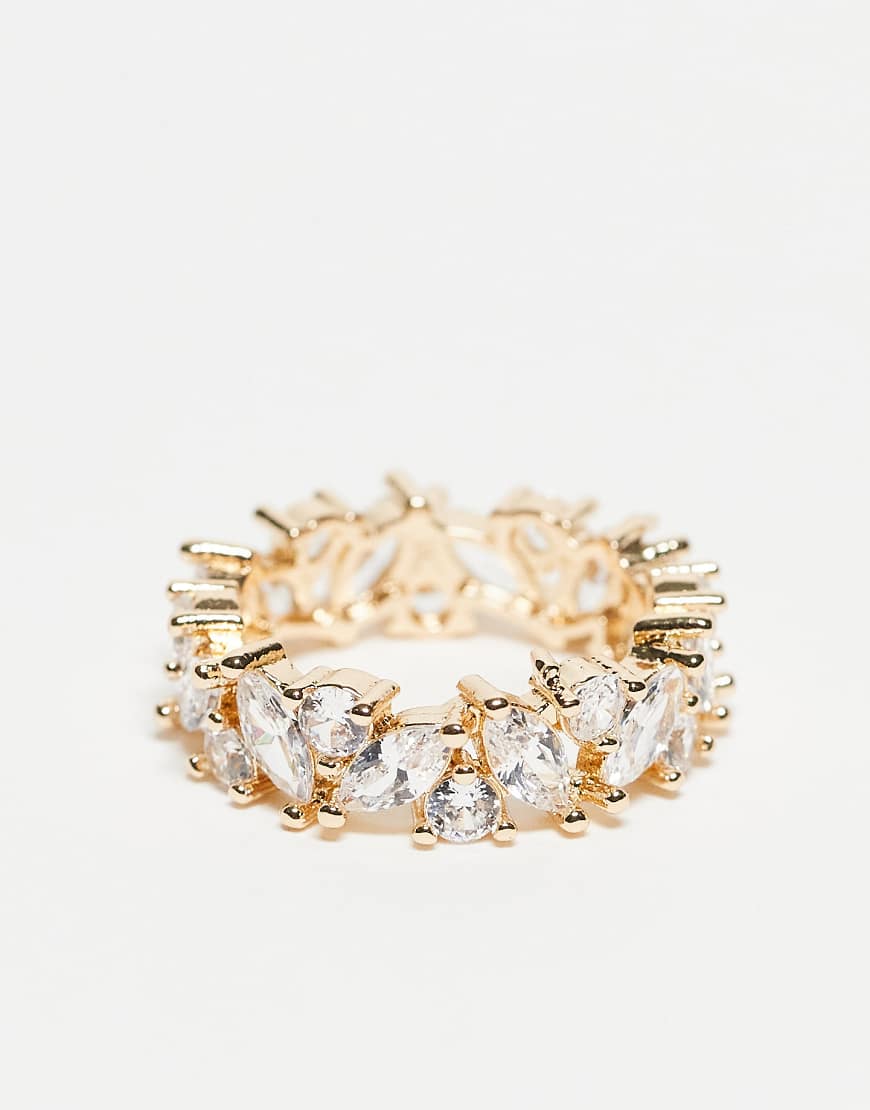ASOS DESIGN - Goldfarbener Baguette-Ring mit transparenten Zirkonia-Schmucksteinen und Geschenkbeutel von ASOS DESIGN
