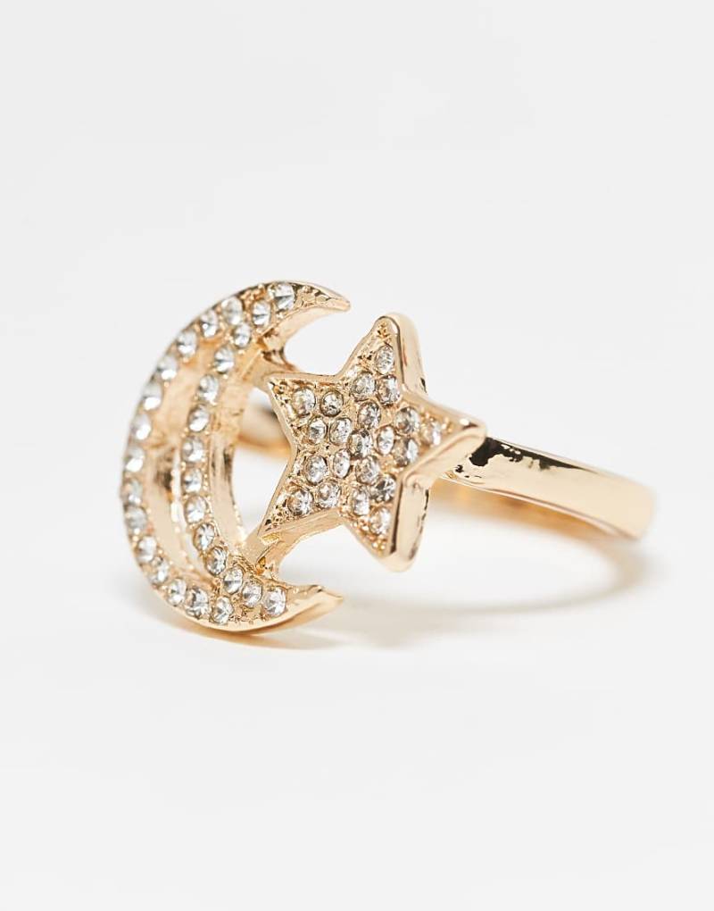 ASOS DESIGN - Goldfarbener Ring mit Stern- und Mond-Design von ASOS DESIGN