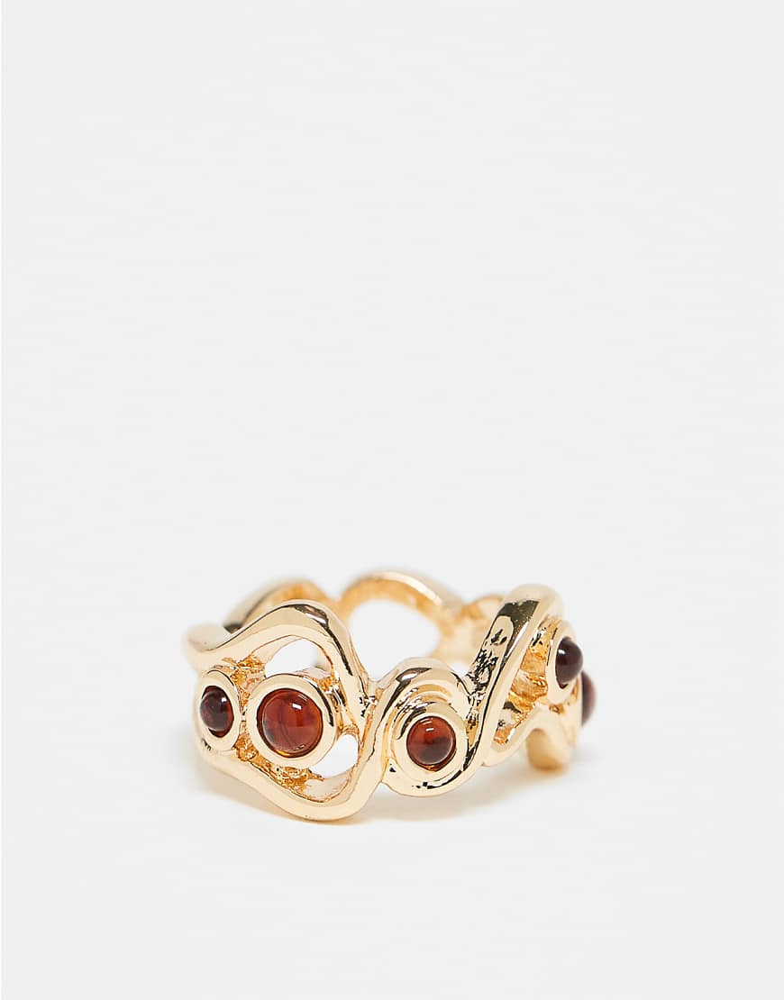 ASOS DESIGN - Goldfarbener Ring mit Wellendesign und eingefassten Schmucksteinen ASOS DESIGN - Goldfarbener Ring mit Wellendesign und eingefassten Schmucksteinen von ASOS DESIGN