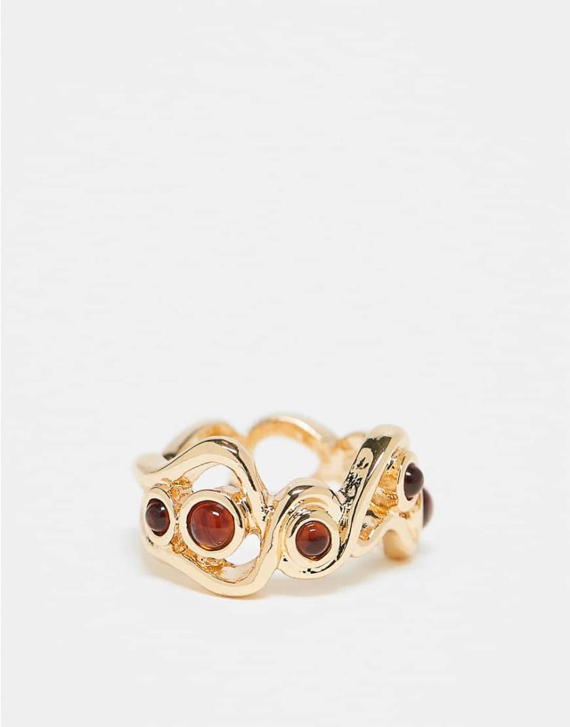 ASOS DESIGN - Goldfarbener Ring mit Wellendesign und eingefassten Schmucksteinen von ASOS DESIGN