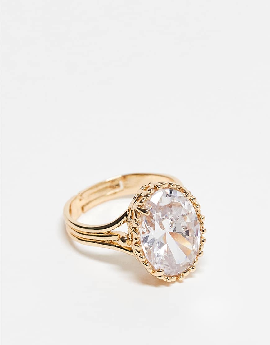 ASOS DESIGN - Goldfarbener Ring mit ovalem Zirkonia-Detail von ASOS DESIGN