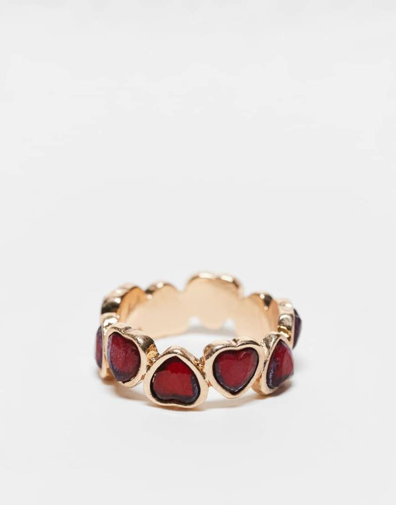 ASOS DESIGN - Goldfarbener Ring mit rubinrotem Kristall-Detail von ASOS DESIGN
