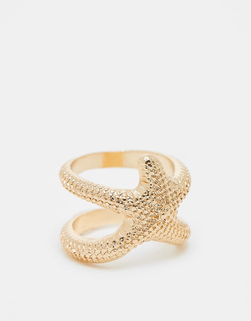 ASOS DESIGN - Goldfarbener texturierter Ring mit Seestern-Design von ASOS DESIGN