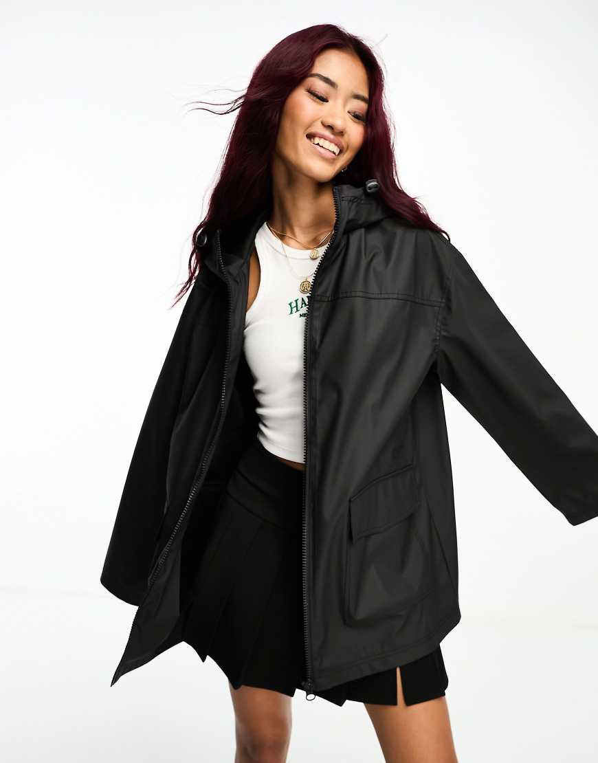 ASOS DESIGN - Gummierter Regenmantel in Schwarz von ASOS DESIGN