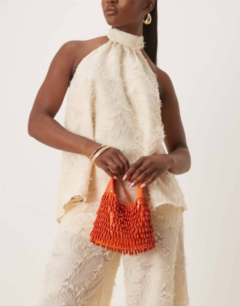 ASOS DESIGN - Handtasche in Orange mit Tropfenperlen von ASOS DESIGN