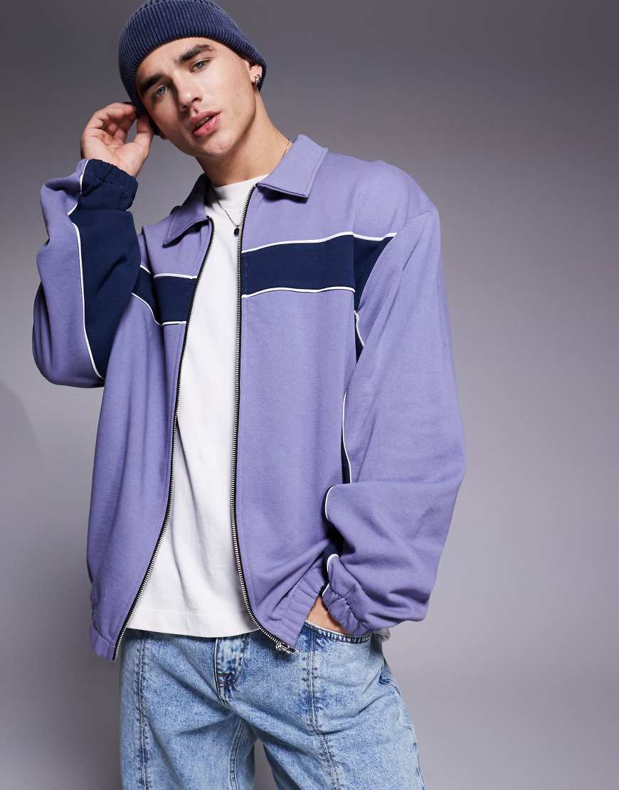 ASOS DESIGN - Harrington-Trainingsjacke in Blau mit Einsätzen und Oversize-Passform-Braun ASOS DESIGN - Harrington-Trainingsjacke in Blau mit Einsätzen und Oversize-Passform-Braun von ASOS DESIGN