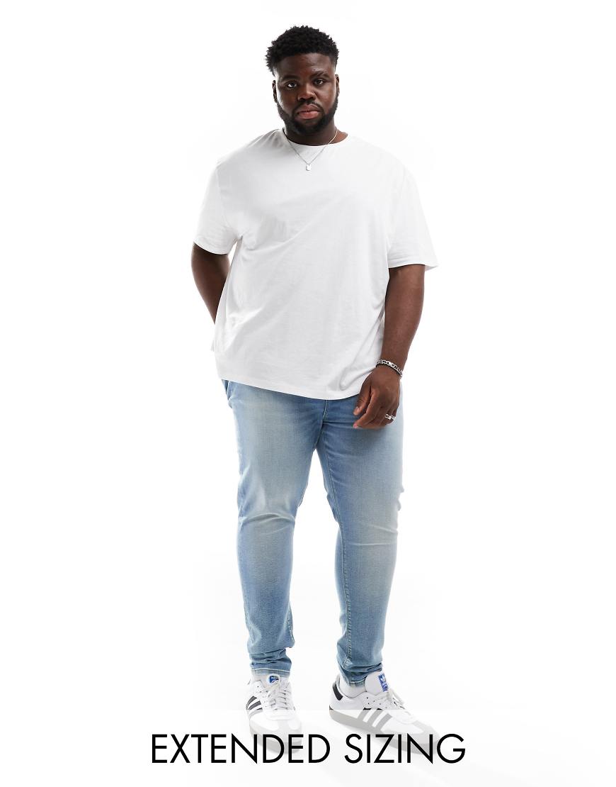 ASOS DESIGN - Hautenge Jeans mit Power-Stretch in verwaschenem Mittelblau ASOS DESIGN - Hautenge Jeans mit Power-Stretch in verwaschenem Mittelblau von ASOS DESIGN