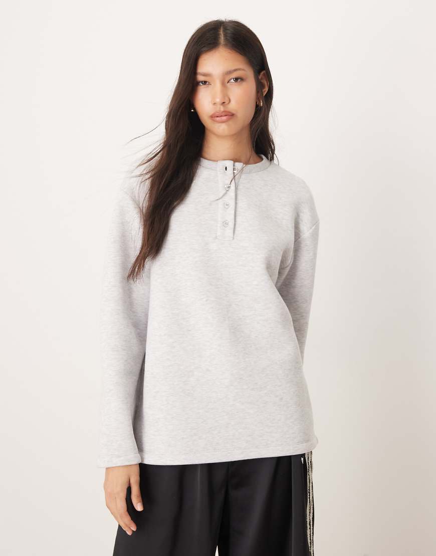 ASOS DESIGN - Henley-Sweatshirt in meliertem Grau mit Oversize-Schnitt von ASOS DESIGN